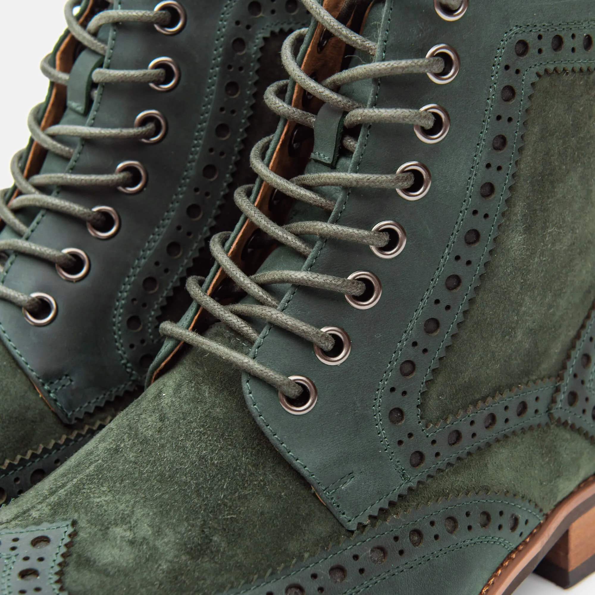 Belmont green leather wingtip combat boots.