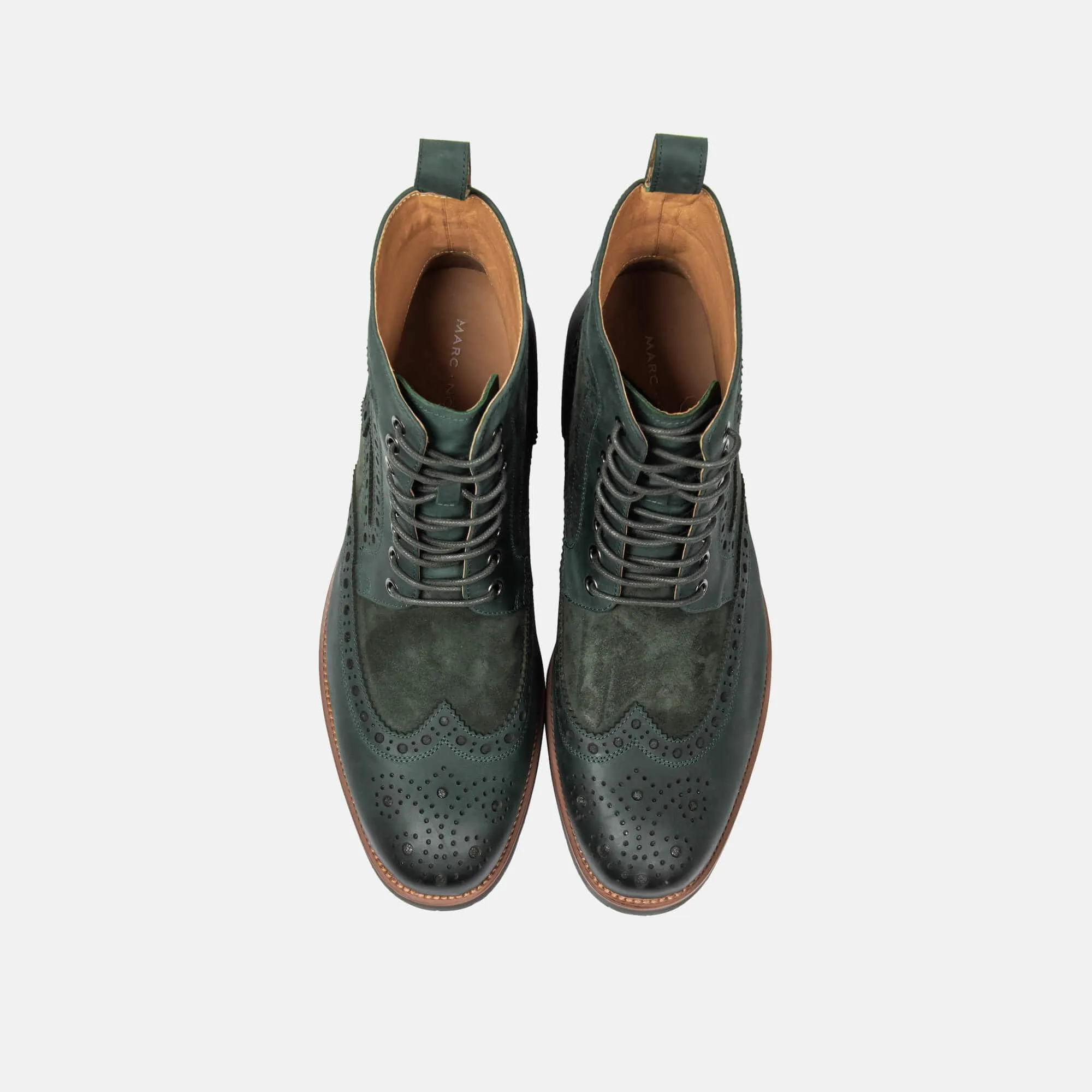 Belmont green leather wingtip combat boots.