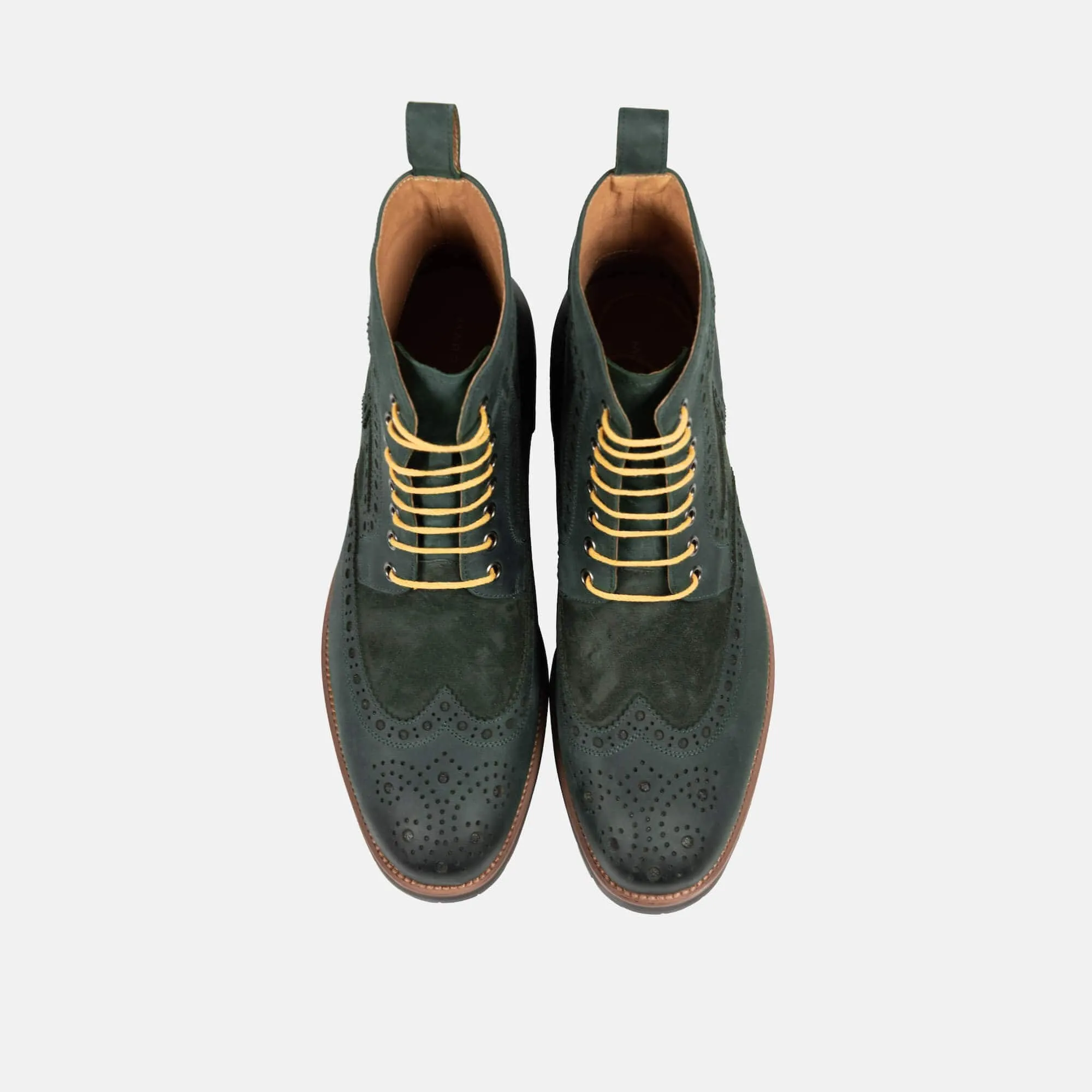 Belmont green leather wingtip combat boots.