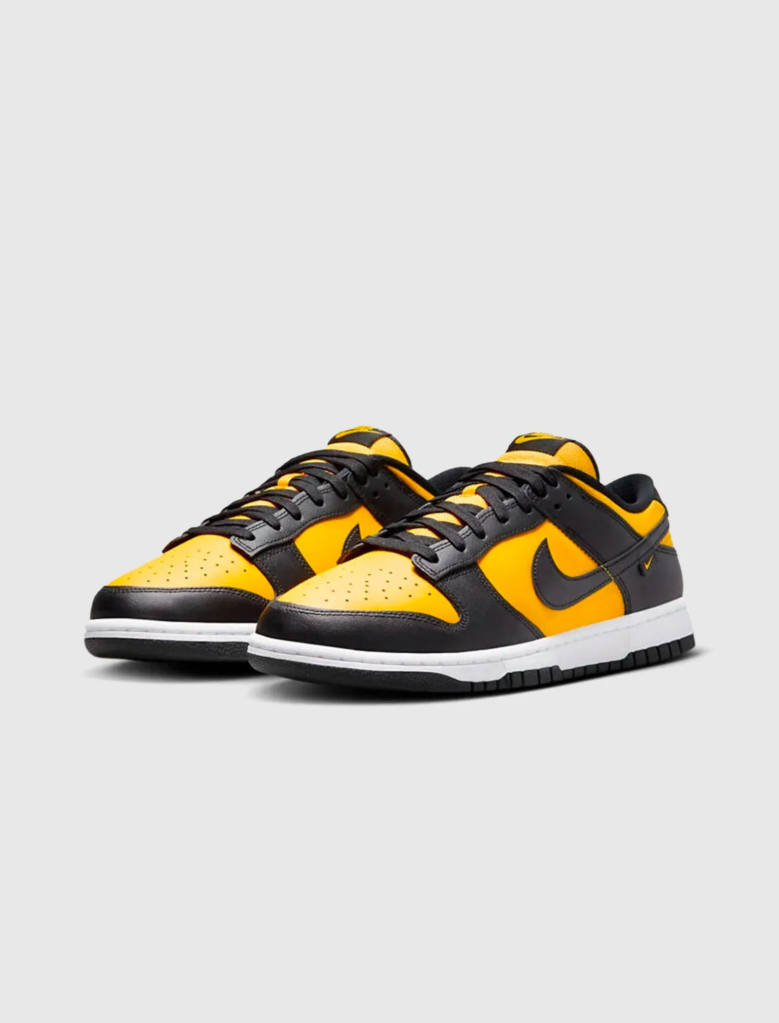 Dunk Low Black University Gold sneaker.