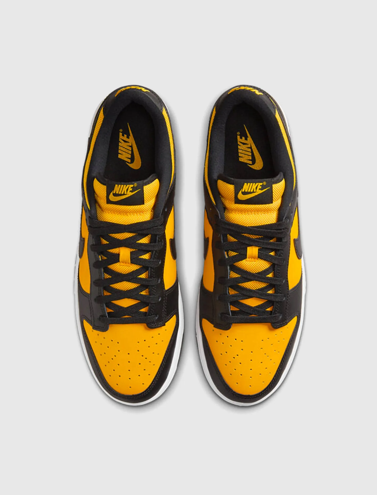 Dunk Low Black University Gold sneaker.