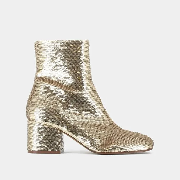 Heeled boots in platinum sequins