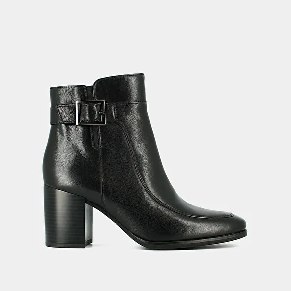 Heeled boots with buckles in black leather