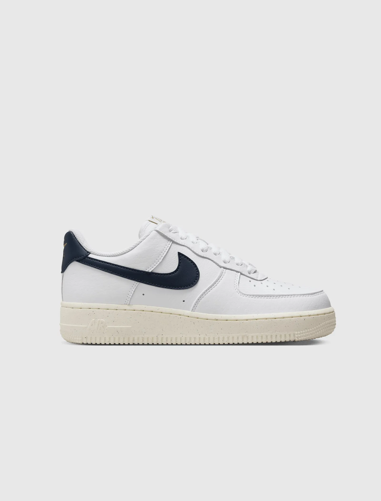 The result is: Nike Women's Air Force 1 '07 Next Nature White/Obsidian/Metallic Gold sneakers